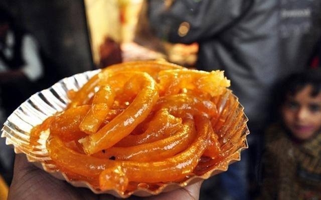 Your only reason to visit India is our food, We will be sharing the dishes that represent India and that you can't miss while you are travelling to these cities. First thing in our list is Jalebi, a lip smacking dessert that you cant miss. Start off with one of the oldest eateries in Delhi. This 100-year-old shop is known for serving giant, hot and juicy Jalebis. Price: Rs 500 per kg Where: 795, Dariba Kalan Road, Dariba Corner, Opposite to Central Baptist Church, Chandni chowk Timings: 8 am to 10 pm